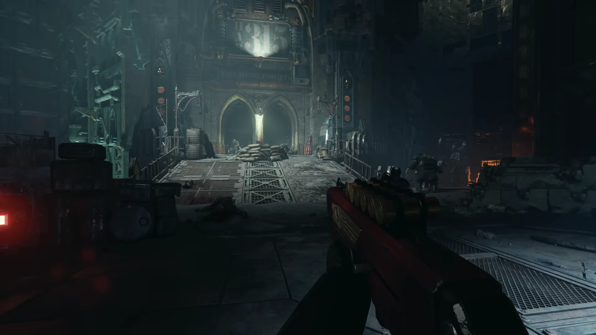 A first-person weapon points across a towering industrial hall towards gothic arches in Warhammer 40,000: Darktide.