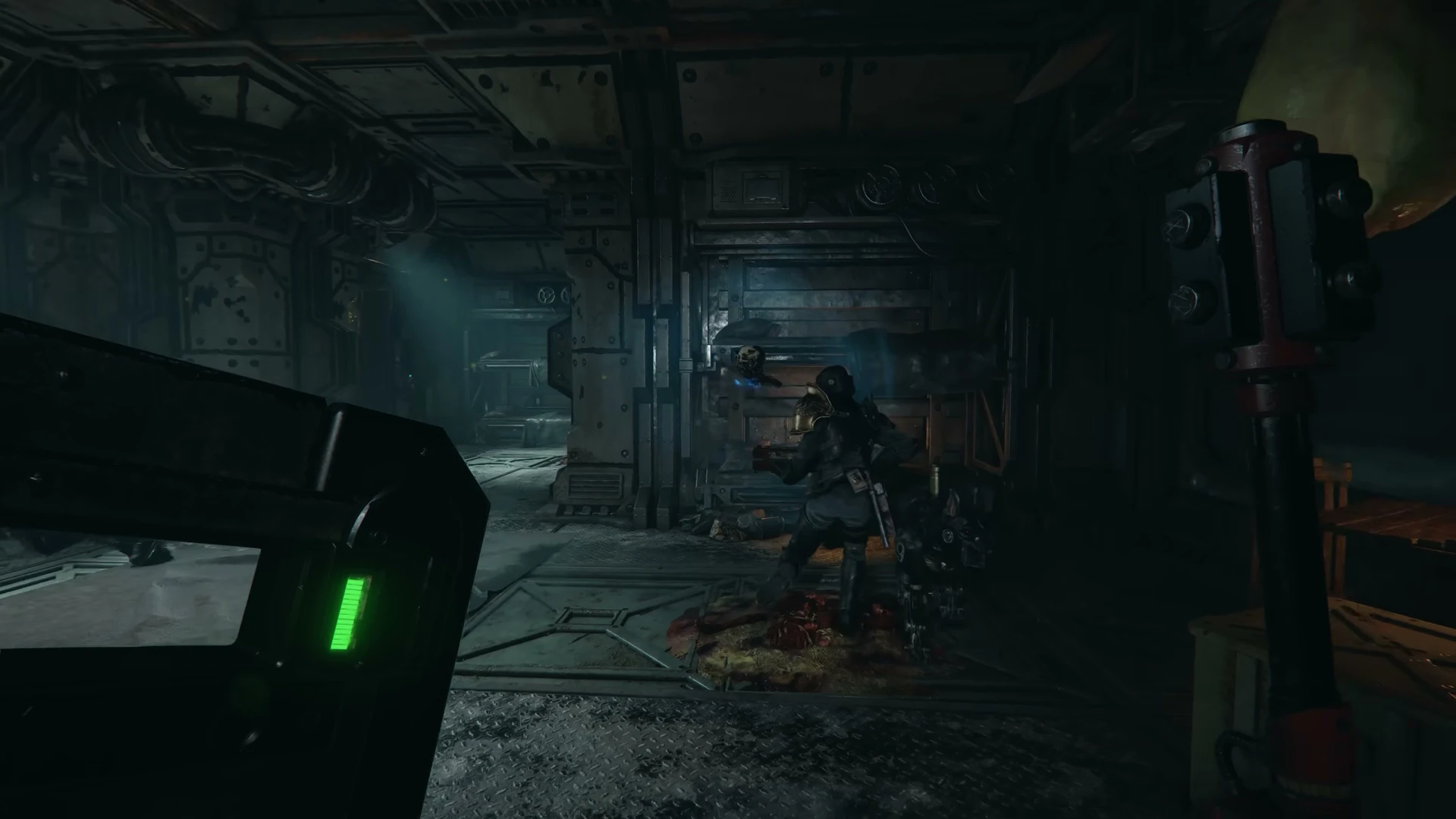 A raised Arbites shield occupies the left foreground while an armoured operative stands beyond it in an industrial room.