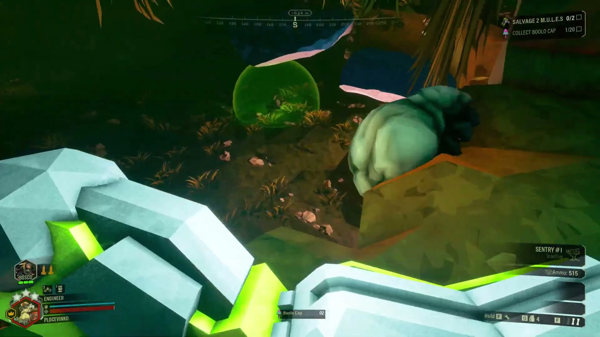 The Engineer looks down into the cavern with a large, glowing object held in view.