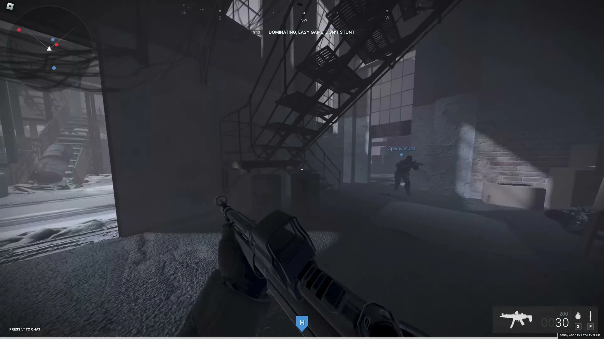 The rifle fills the foreground; a broad pillar divides a warehouse, with stairs and a blue-marked character beyond it.